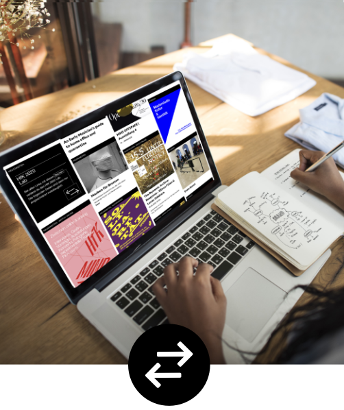 Laptop auf dem die Website der HFK-Bremen zusehen ist und ein Notizheft